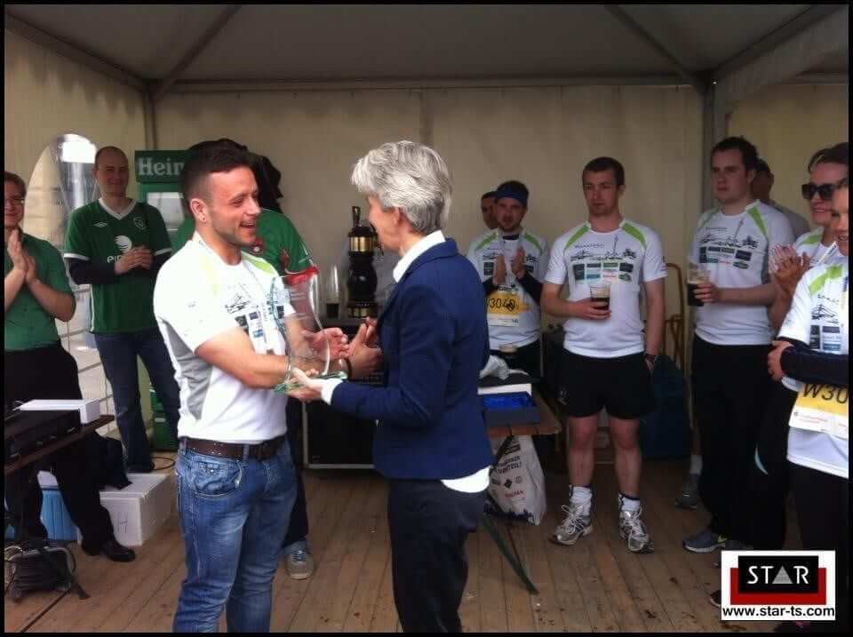 Dominick Branigan being awarded his IBN trophy at the IBN marathon in Duesseldorf