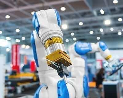 Manufacturing translation services, robotic arm